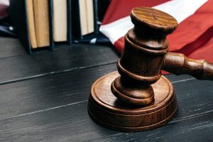 Judge gavel on the background of the flag united states of America